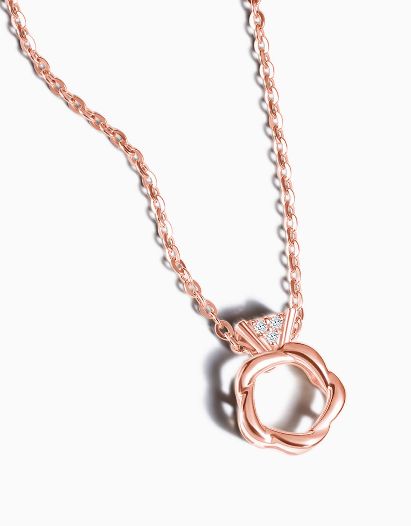 LVC diamond necklace with Mini Ring Diamond Pendant features a rose gold ring with the design of the band shaped similarly to a rose in rose gold