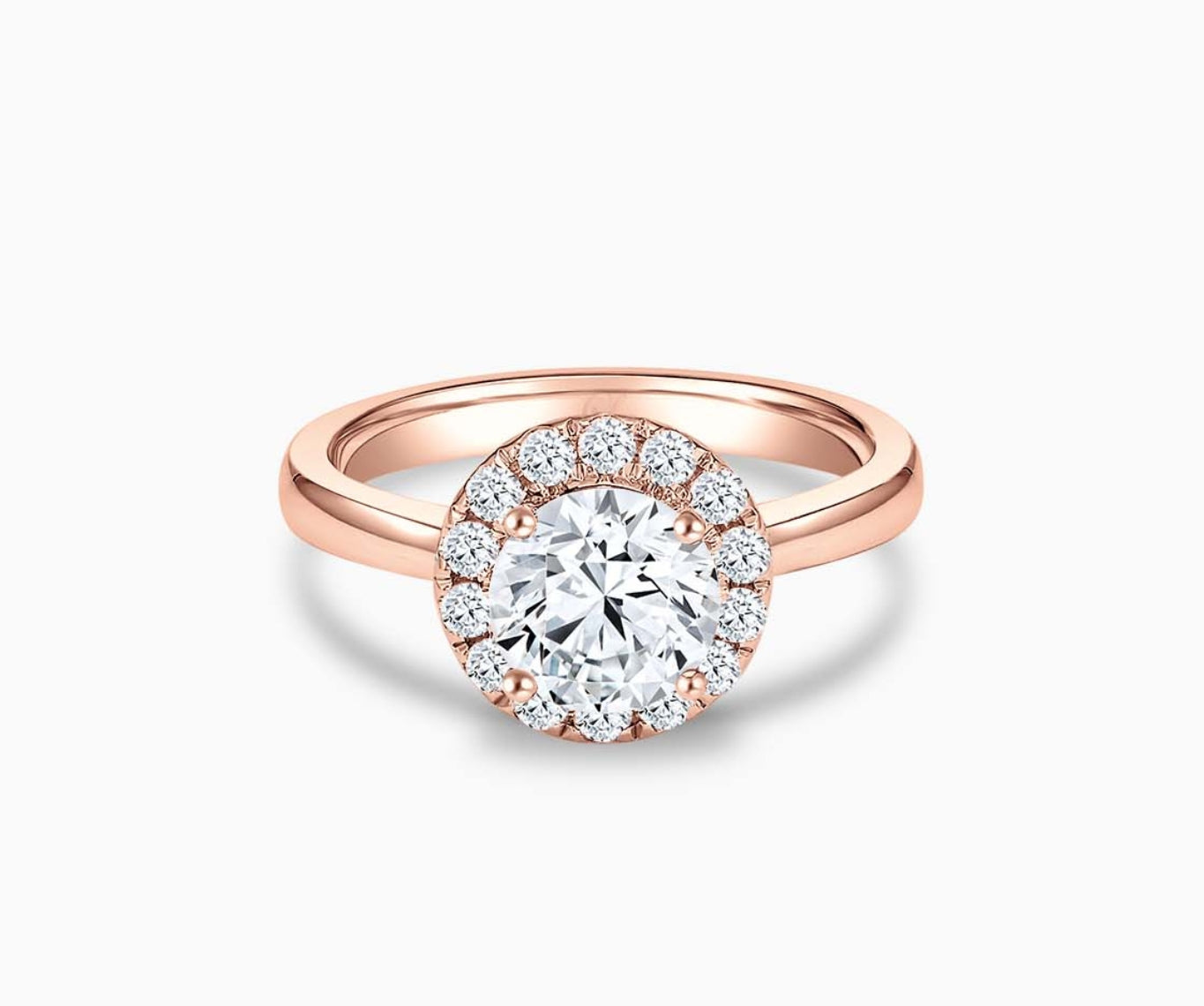 round diamond halo engagement ring set in rose gold with a straight plain band design