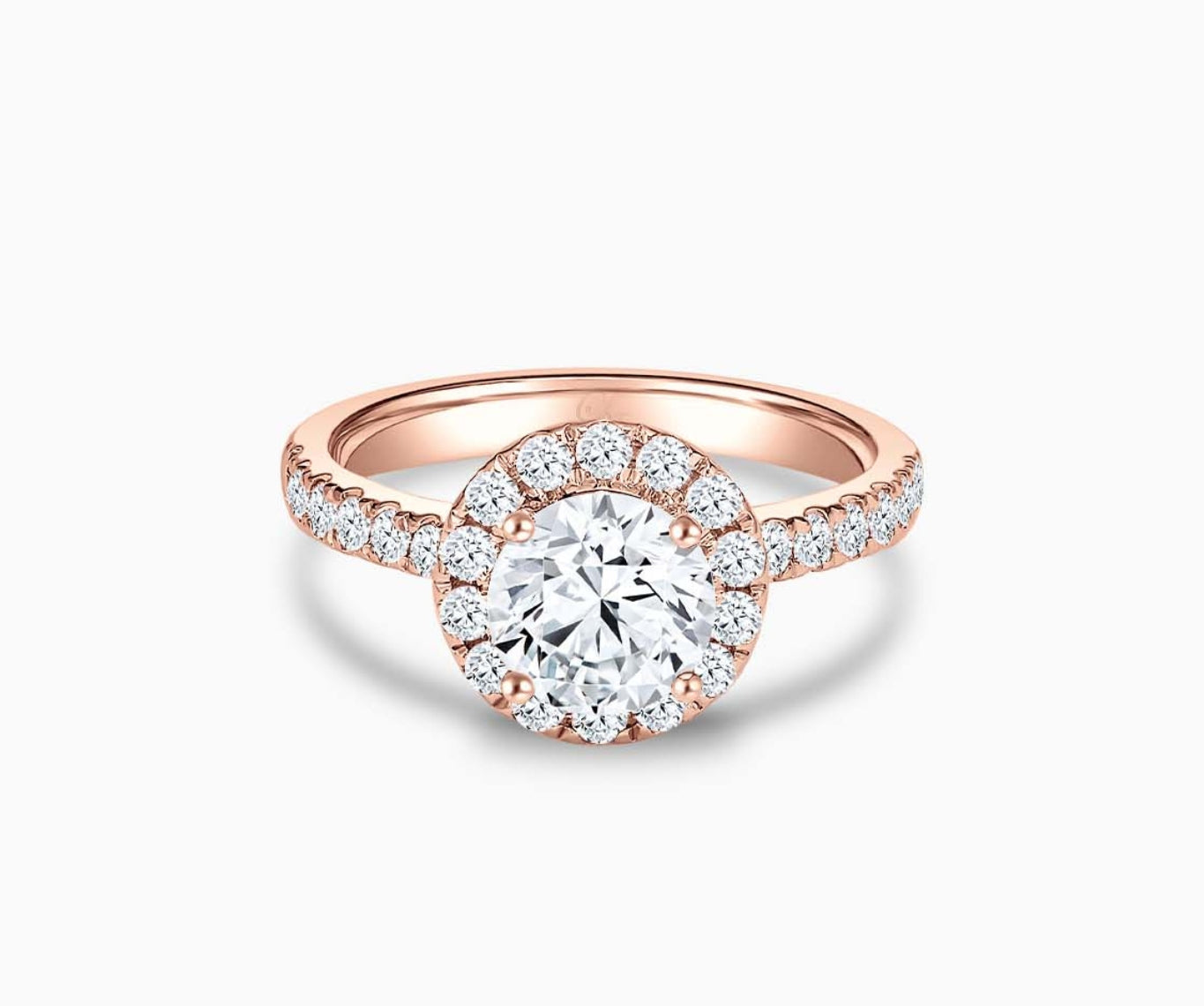 round diamond halo engagement ring set in rose gold with a straight pave band design