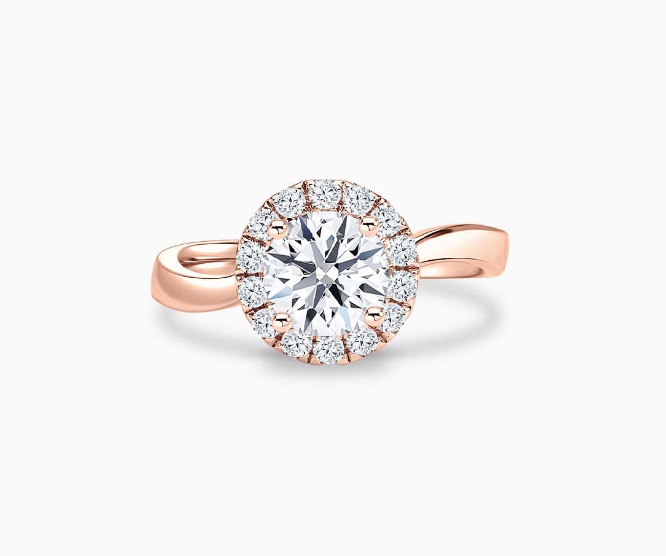 round diamond halo engagement ring set in rose gold with a twirl plain band design