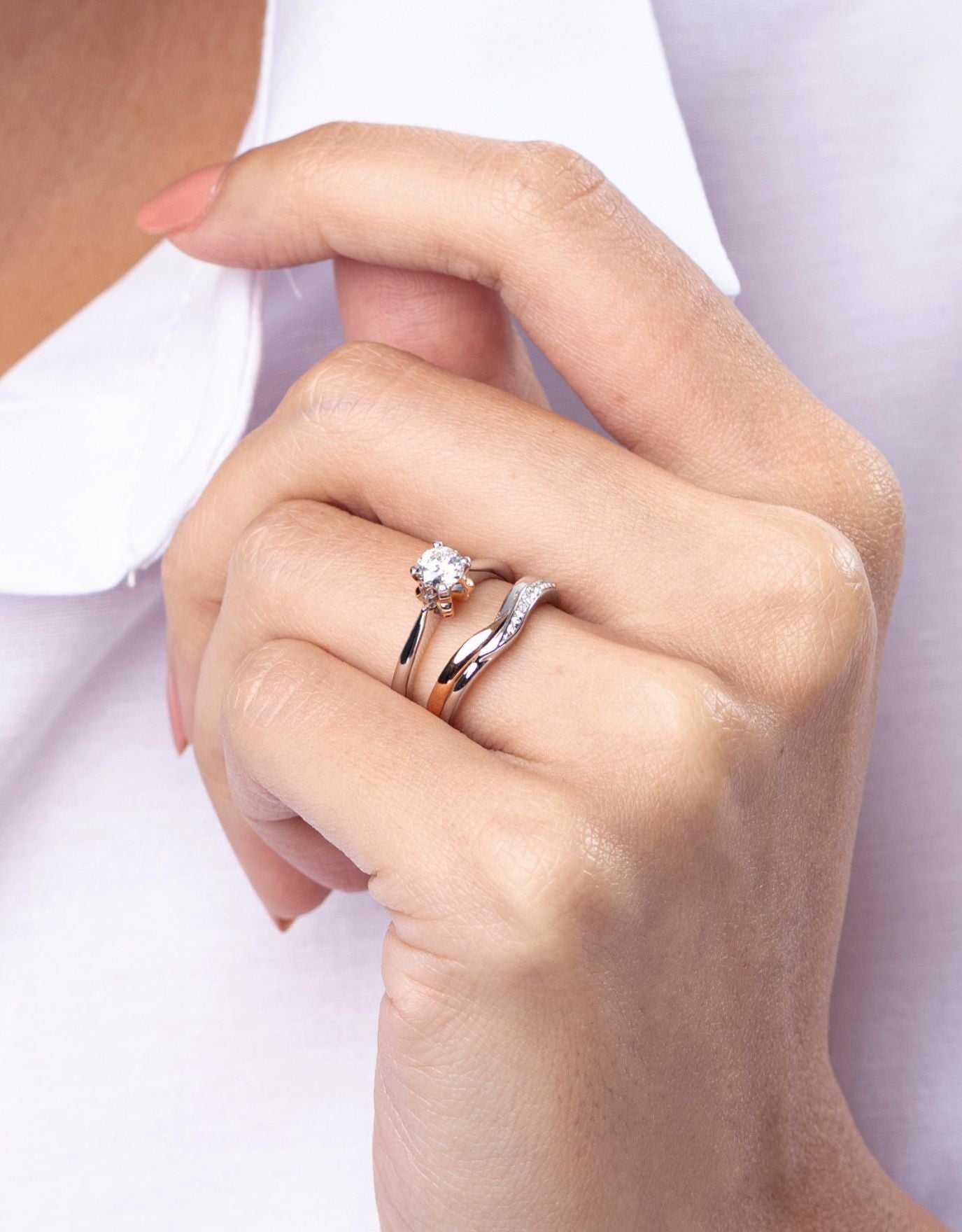 LVC wedding ring stacked with an engagement ring 