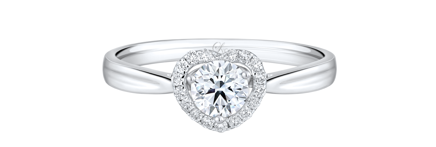 LVC a close up of lab grown diamond ring in white gold with heart shaped halo and a tapered band setting