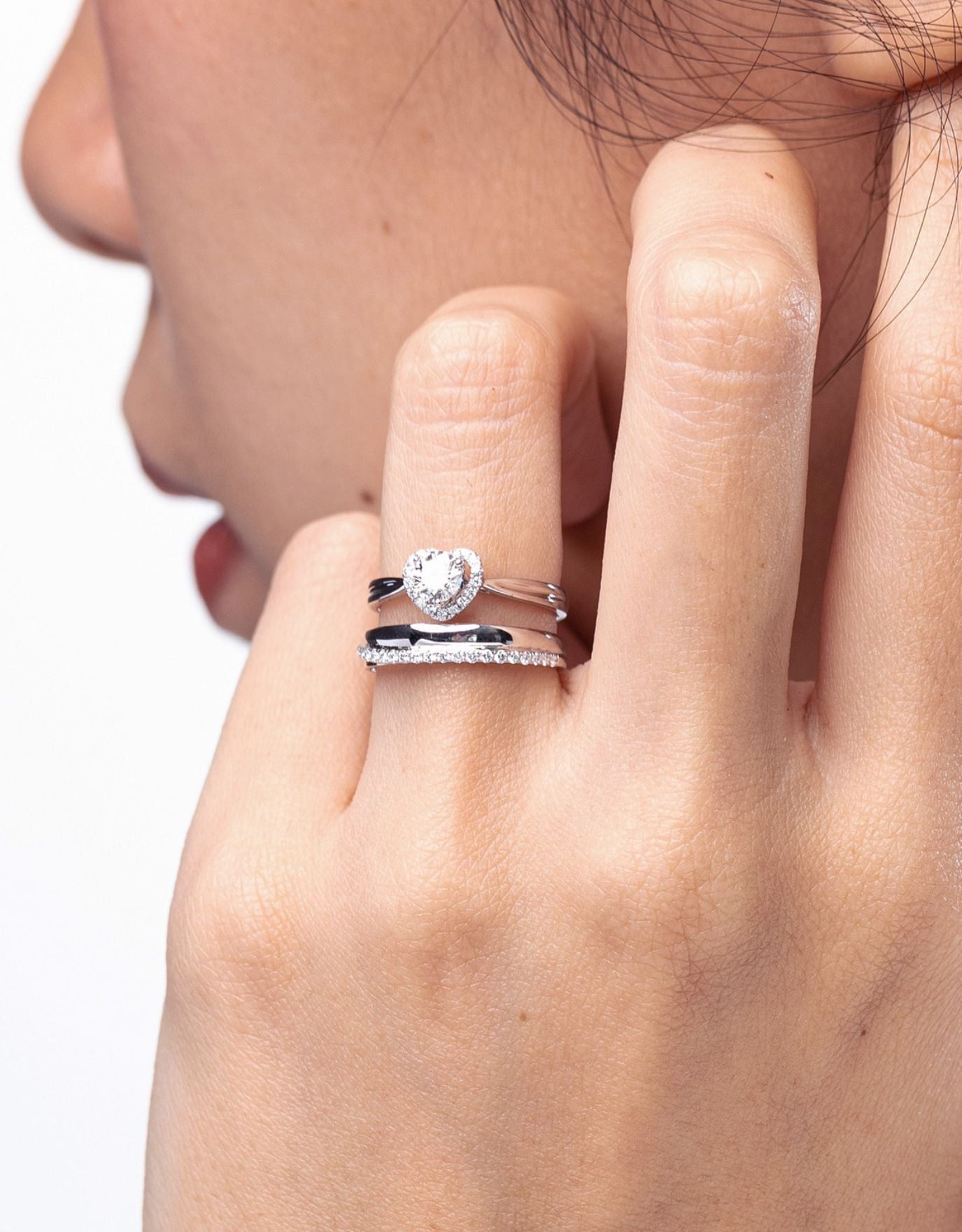 LVC lab grown diamond ring with a tapered band setting in white gold and a heart shaped halo surrounding the diamond