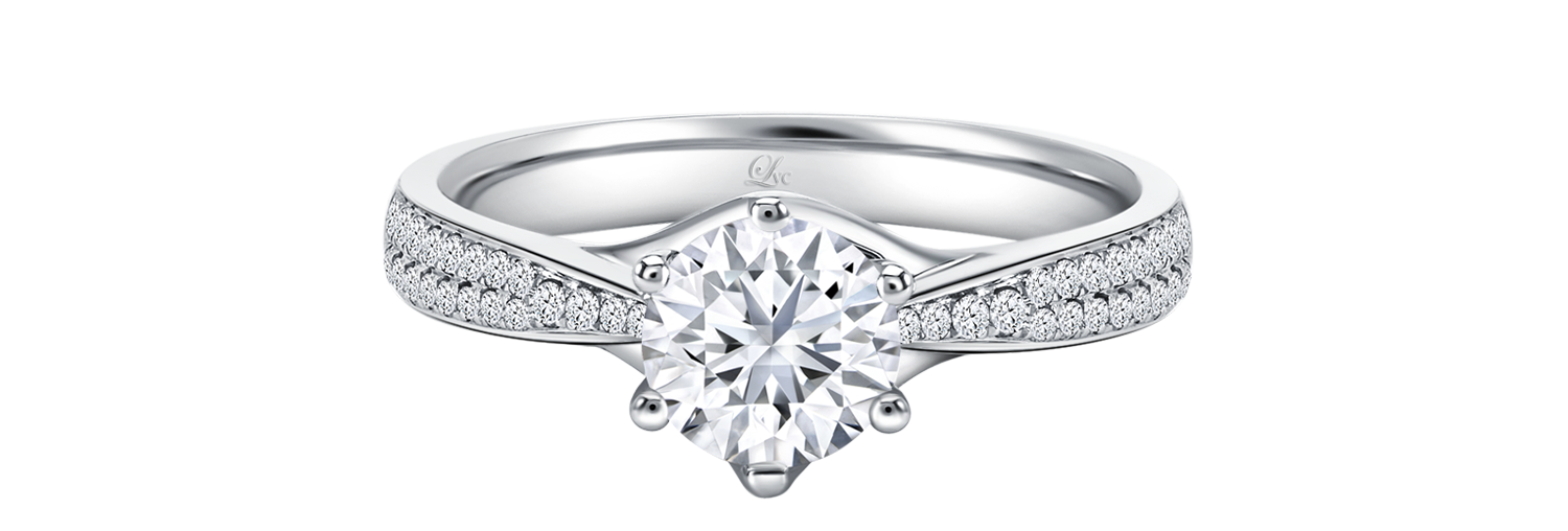 LVC  a close up of the lab grown diamond ring in white gold with a tapered paved band setting with 6 prongs