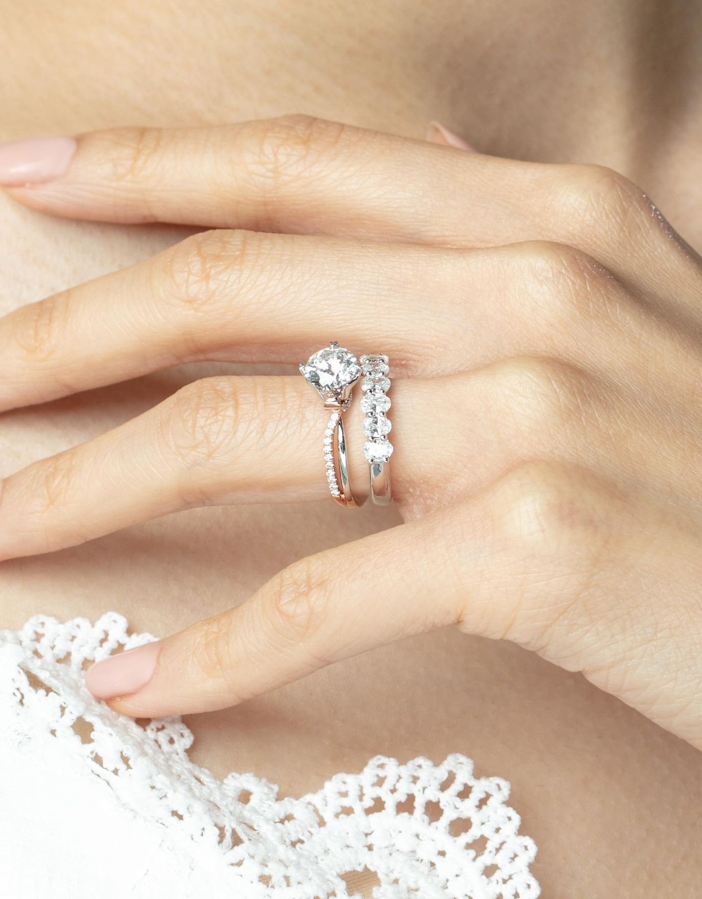 LVC wedding ring with a eternity ring design stacked with an engagement ring
