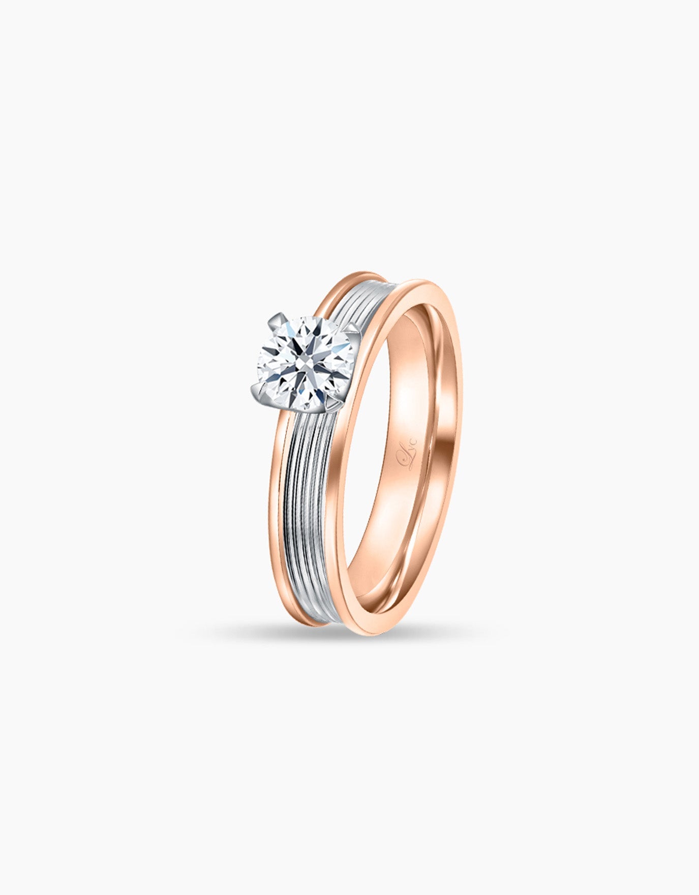LVC lab grown diamond ring in rose gold with inner white gold and 4 prongs holding the diamond