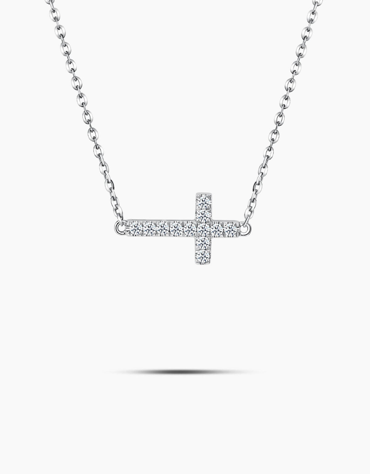 LVC diamond necklace in white gold with a cross pendant encrusted with diamonds from different angle