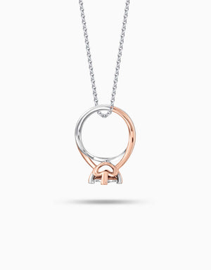 LVC diamond necklace in white gold with Mini Ring Diamond Pendant in white and rose gold with heart prongs that hold the diamond in place