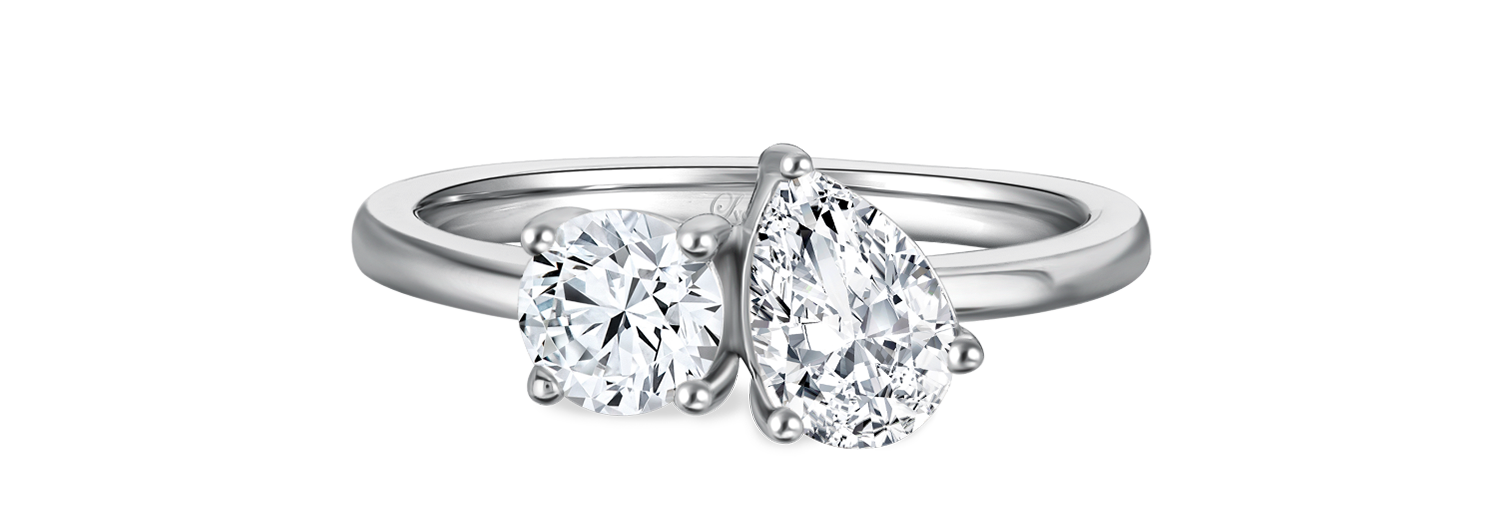 LVC a close up of the lab grown diamonds in the teardrop shape and a round shape in white gold