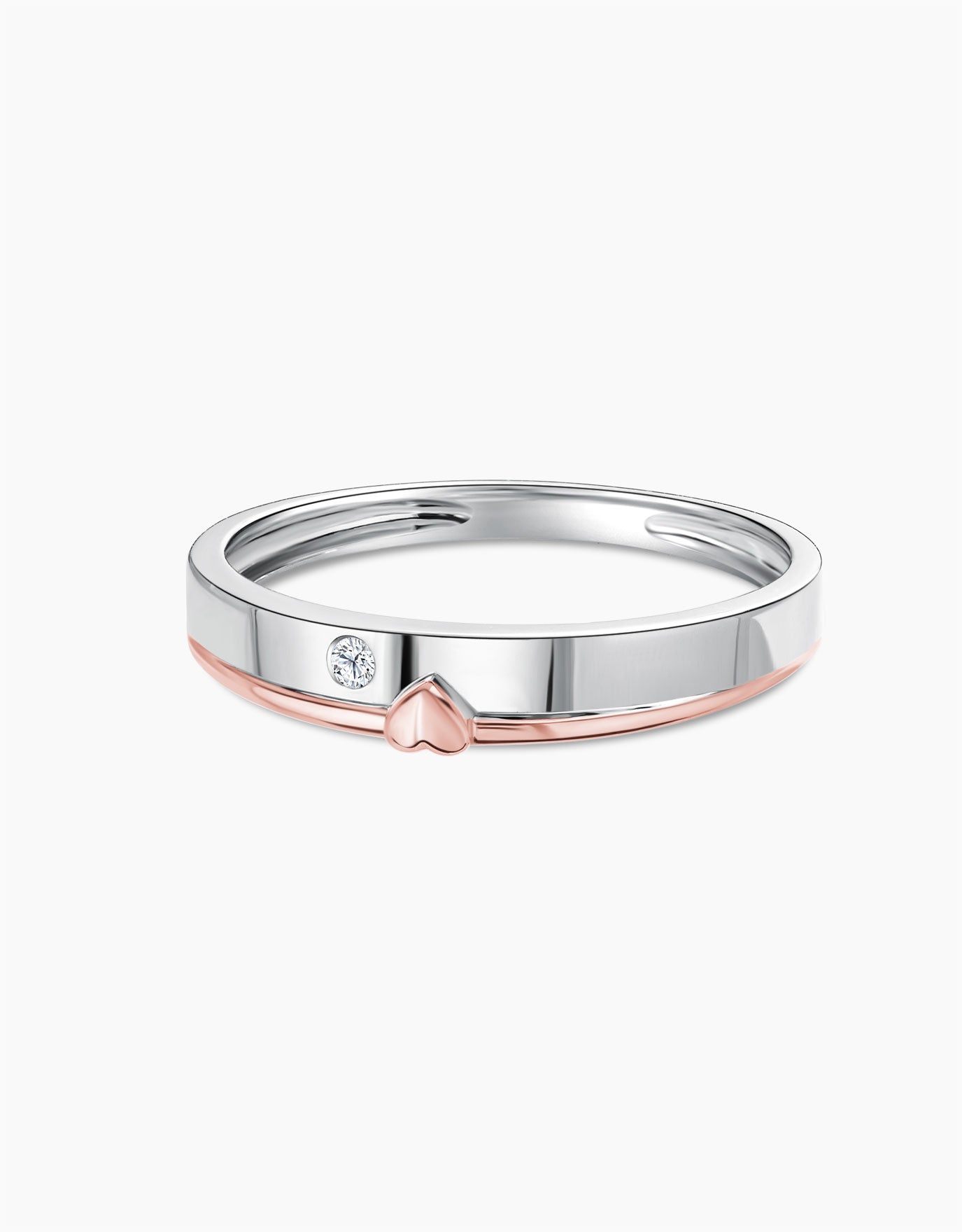 LVC mens diamond ring in 14k white gold and rose gold with a heart symbol on the rose gold band and a single diamond on the white gold band