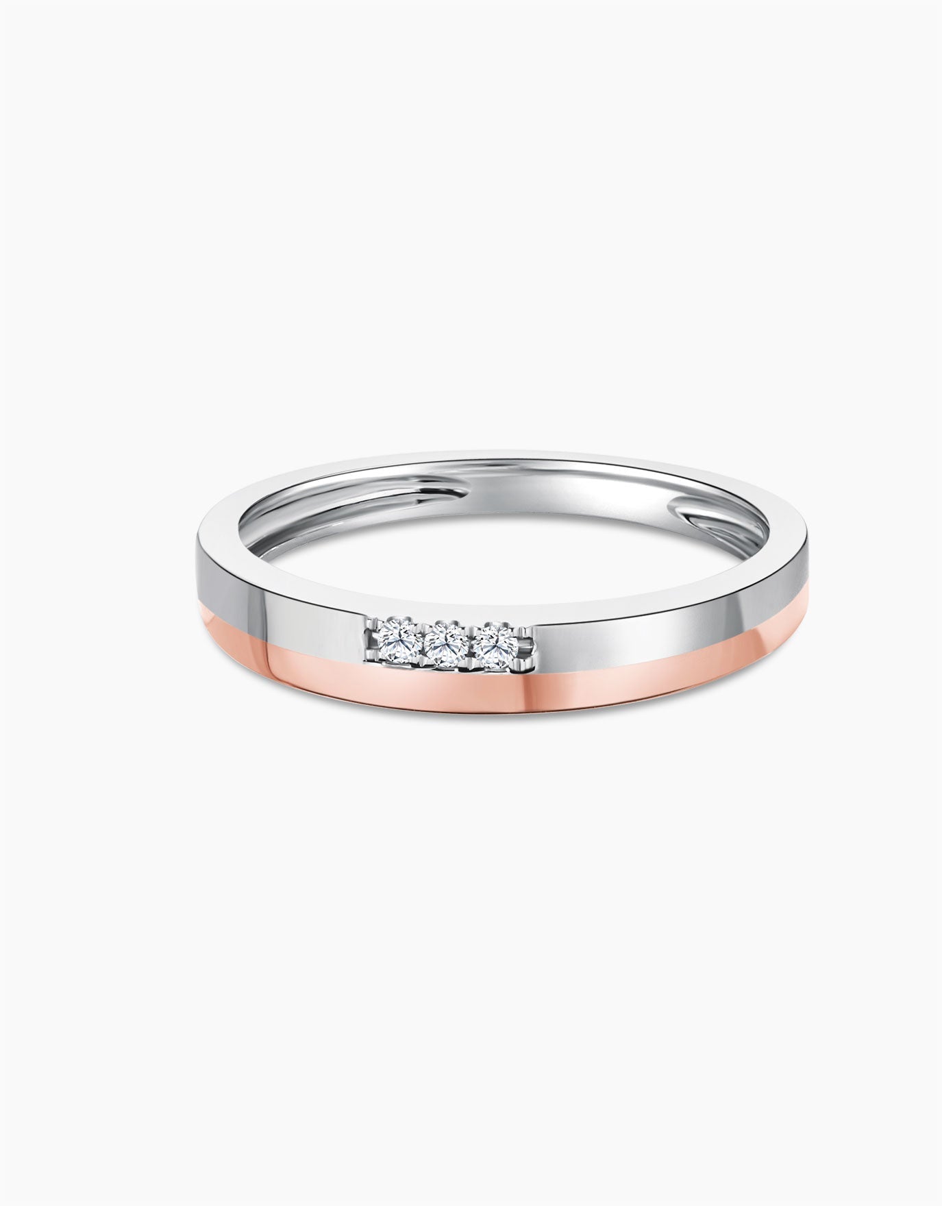 LVC wedding ring in 14k white gold and rose gold created with duo tone with three brilliant diamonds on the white band to add some sparkle