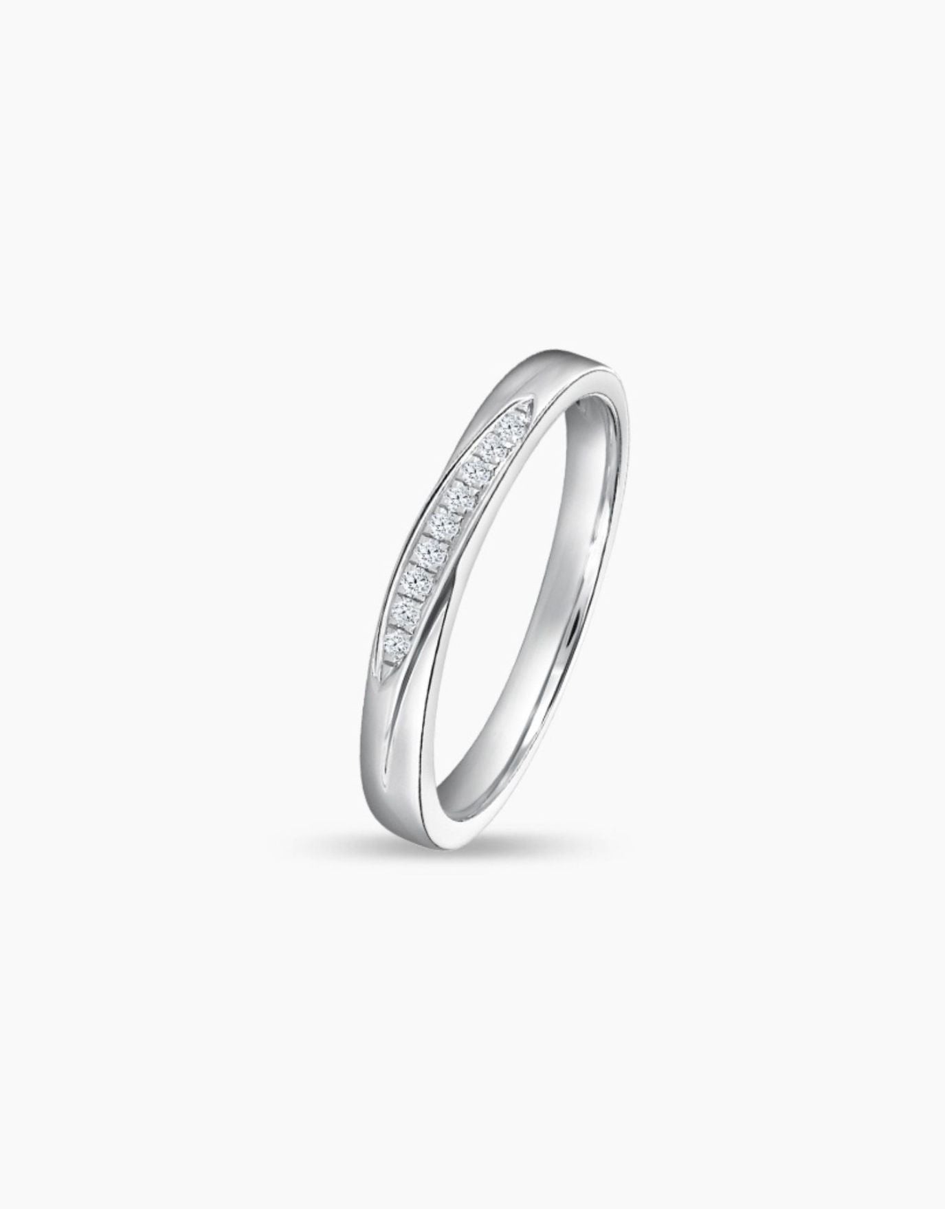LVC wedding band designed with a curved row of stunning diamonds seen from different angle
