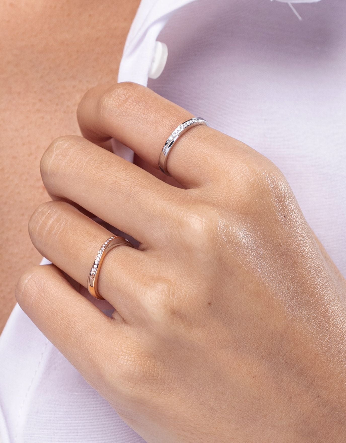 LVC wedding band designed with a curved row of stunning diamonds worn on finger for simple and elegant look