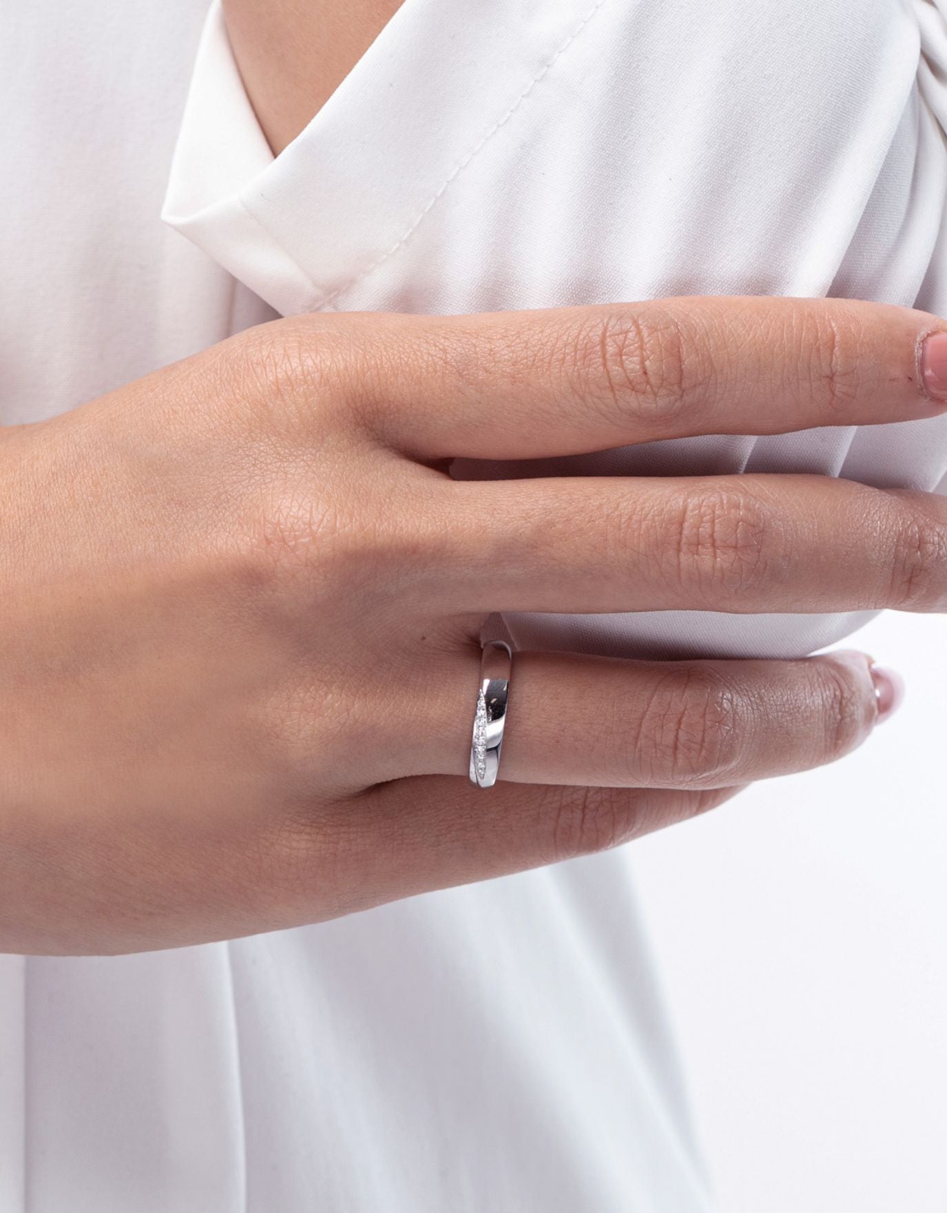 LVC platinum ring worn on the ring finger as a wedding ring