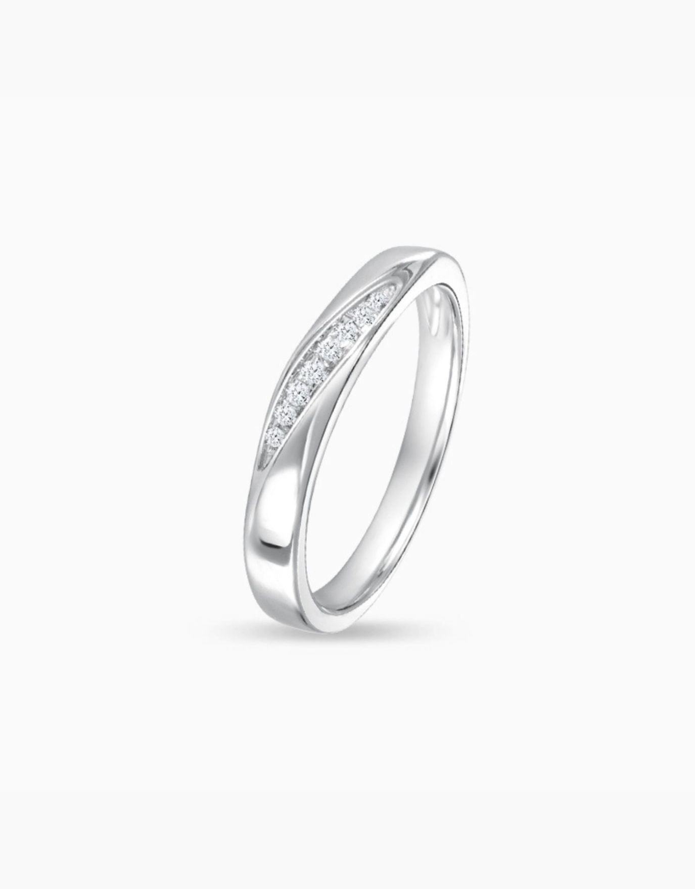 LVC wedding band designed with a leaning row of round diamonds for everyday wear seen from another angle