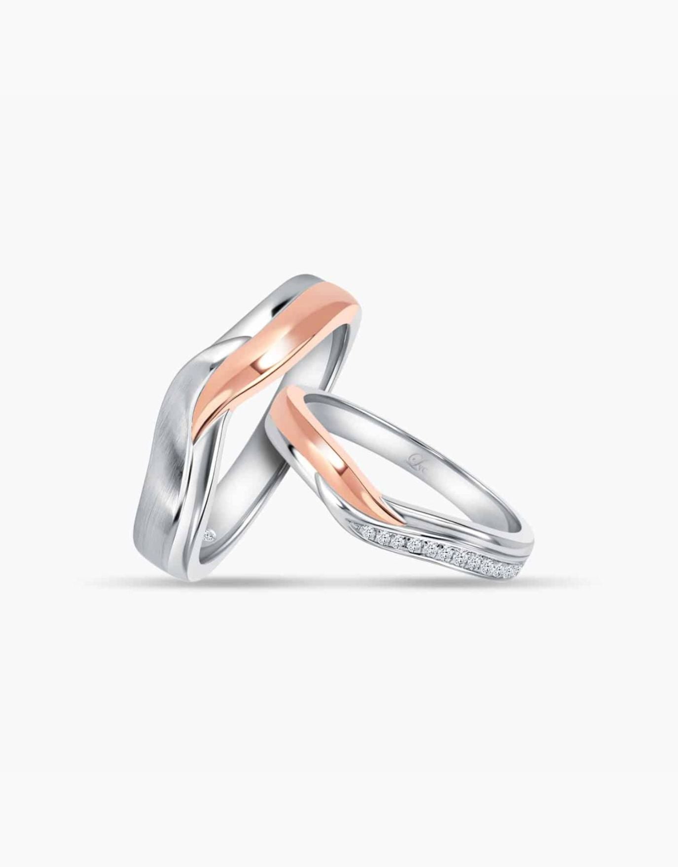 LVC couple wedding rings designed with a curved arc of overlapping lines of white and rose gold for a sophisticated and unique twist