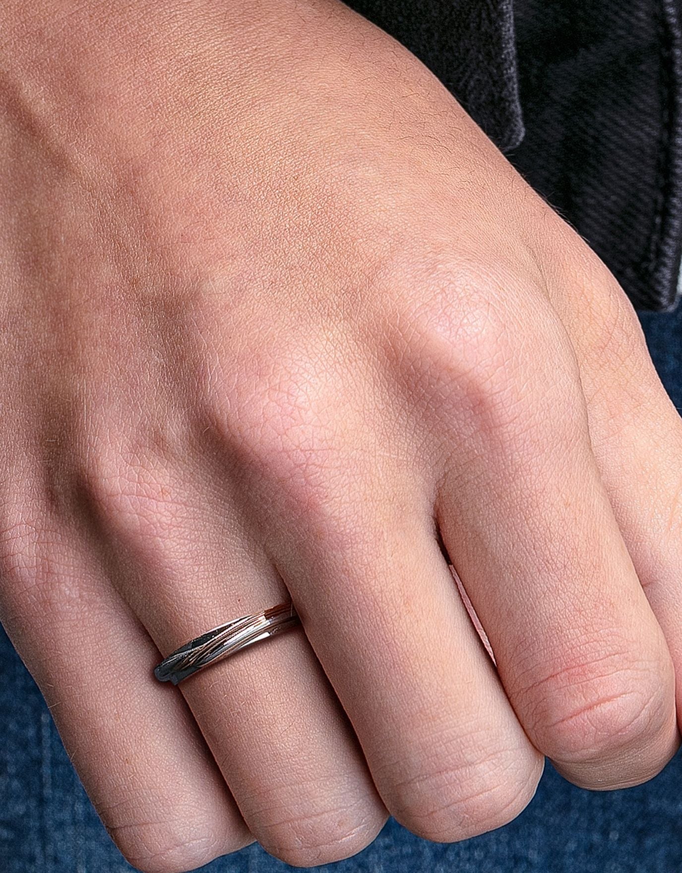 LVC mens diamond ring designed with bold lines of white and rose gold for the modern look worn on ring finger