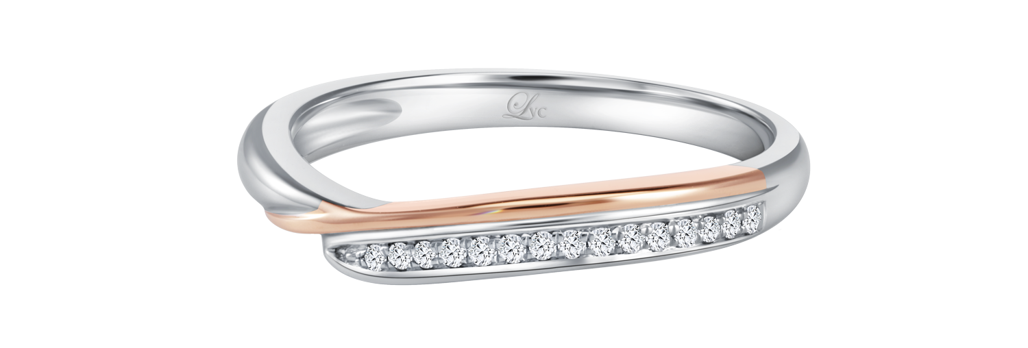LVC wedding band designed with a curved row of diamonds in white and rose gold close up look 