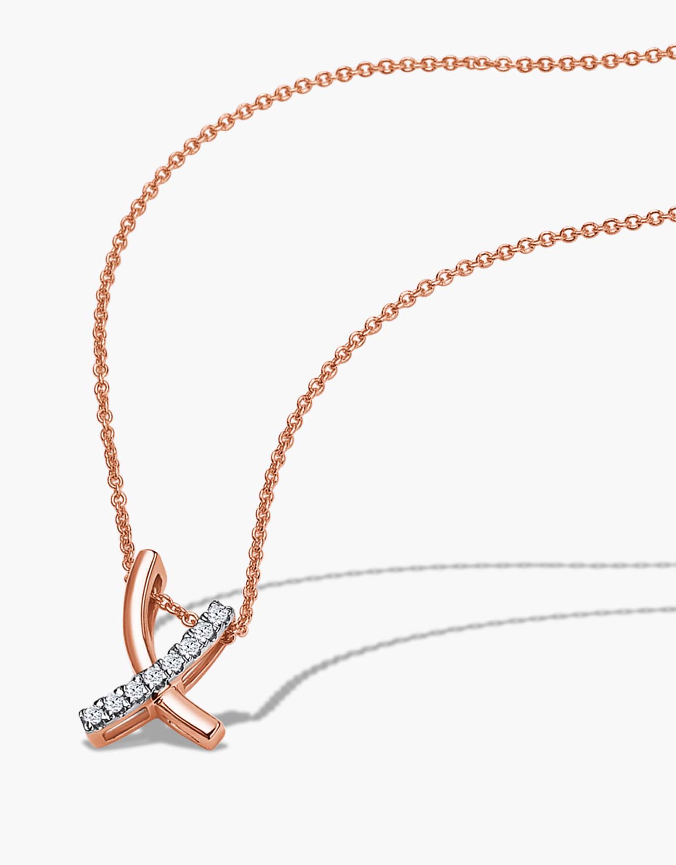 LVC rose gold necklace designed with 2 overlapping rose gold curves into a delicate x