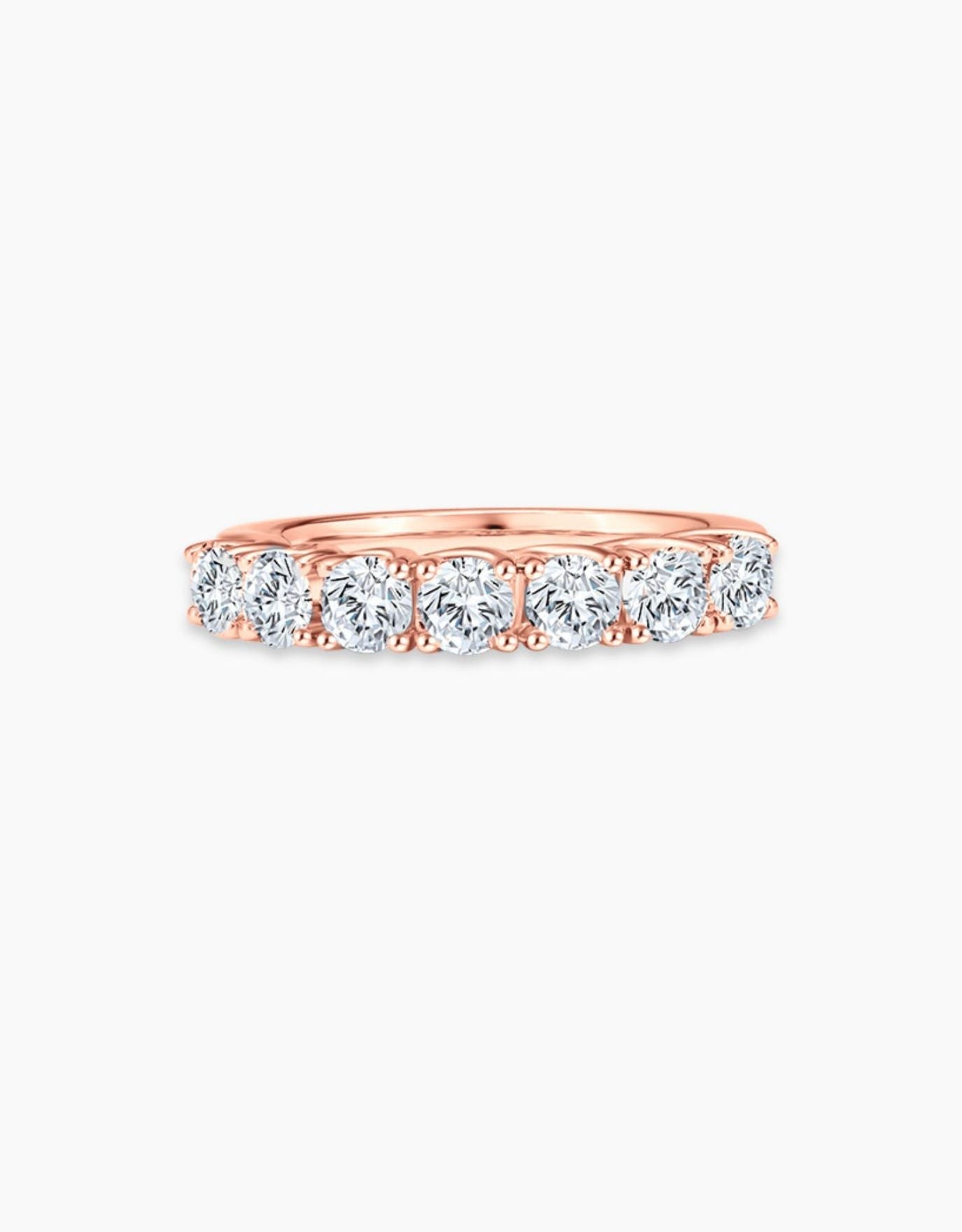 LVC wedding band in rose gold traced with glistening diamonds set in a pave setting