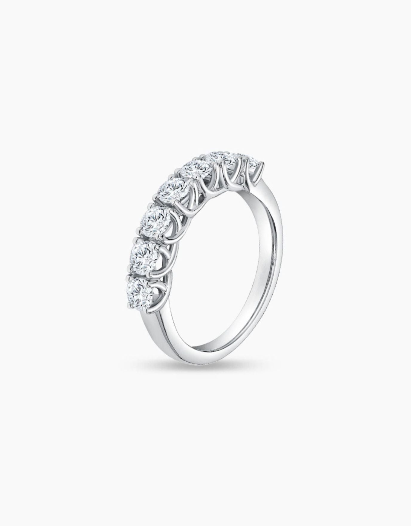 LVC wedding band in white gold traced with glistening diamonds set in a pave setting seen from different angle