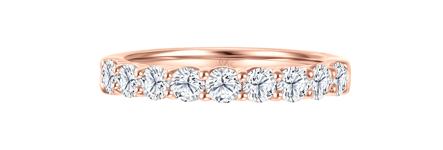 LVC a close up of the wedding ring with 9 lab grown diamonds on a rose gold band