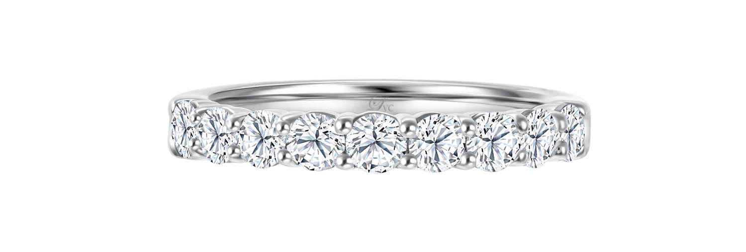 LVC a close up of the wedding ring with 9 lab grown diamonds on a white gold band