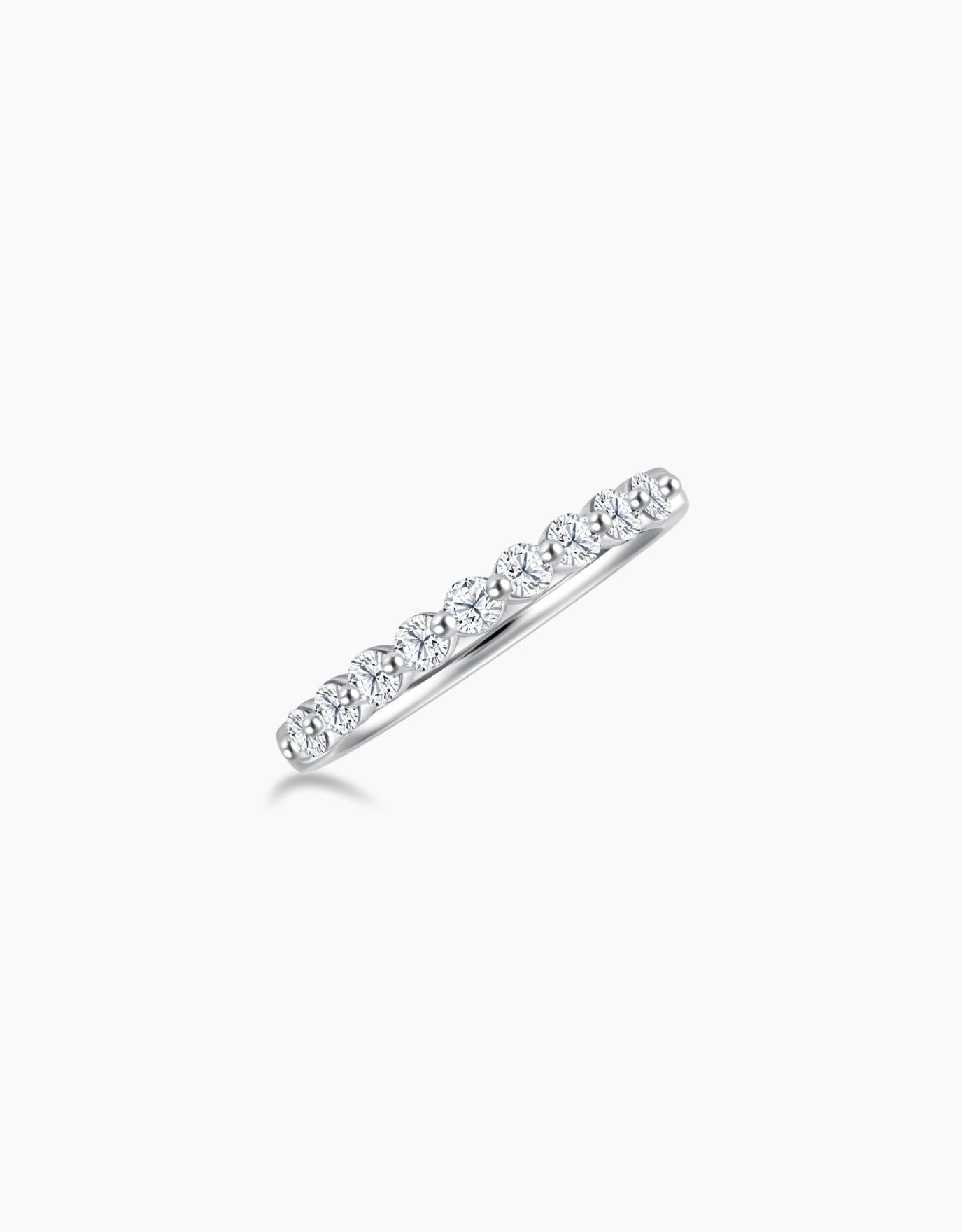 LVC wedding ring in white gold band with a row of 9 glistening lab grown diamonds