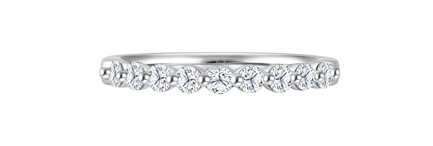 LVC a close up of the wedding ring with 9 lab grown diamonds on a white gold wedding band
