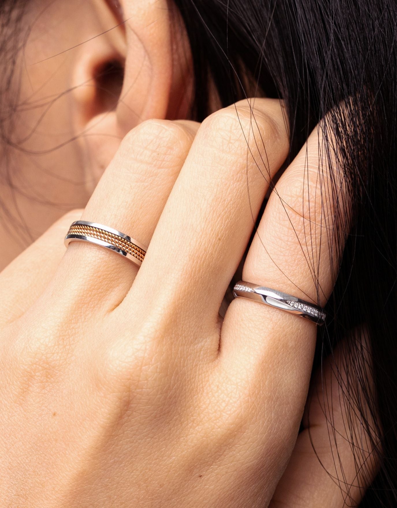 LVC white gold wedding ring with two rows on diamonds worn on the index finger