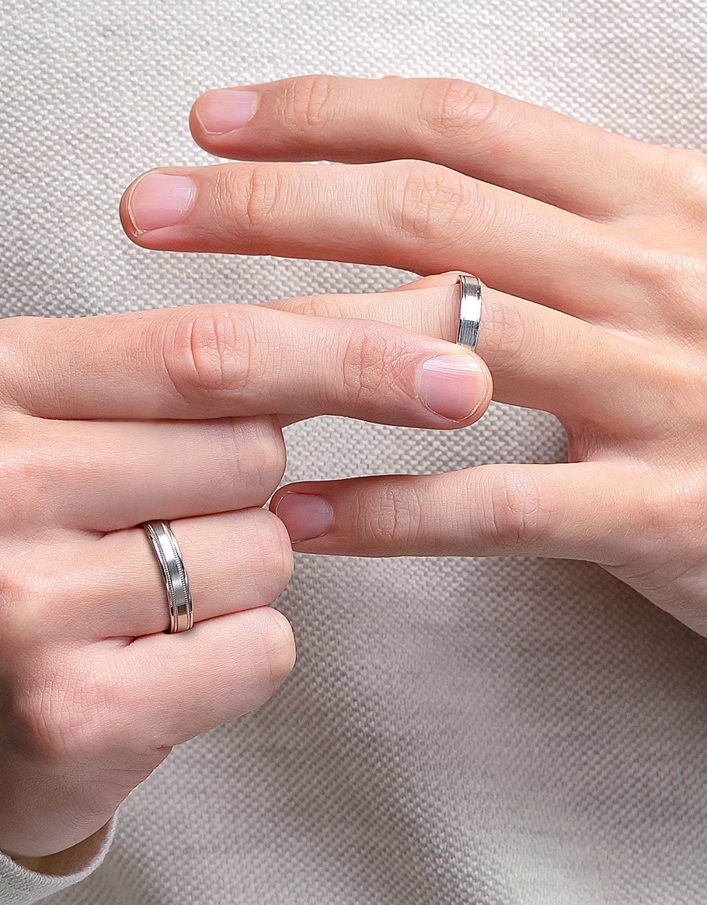 LVC men wedding ring in platinum being worn by the man on his ring finger