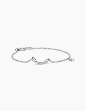 LVC diamond bracelet with cupid's bow as the charm in white gold