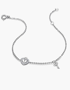 LVC diamond bracelet with a heart lock and a key in white gold