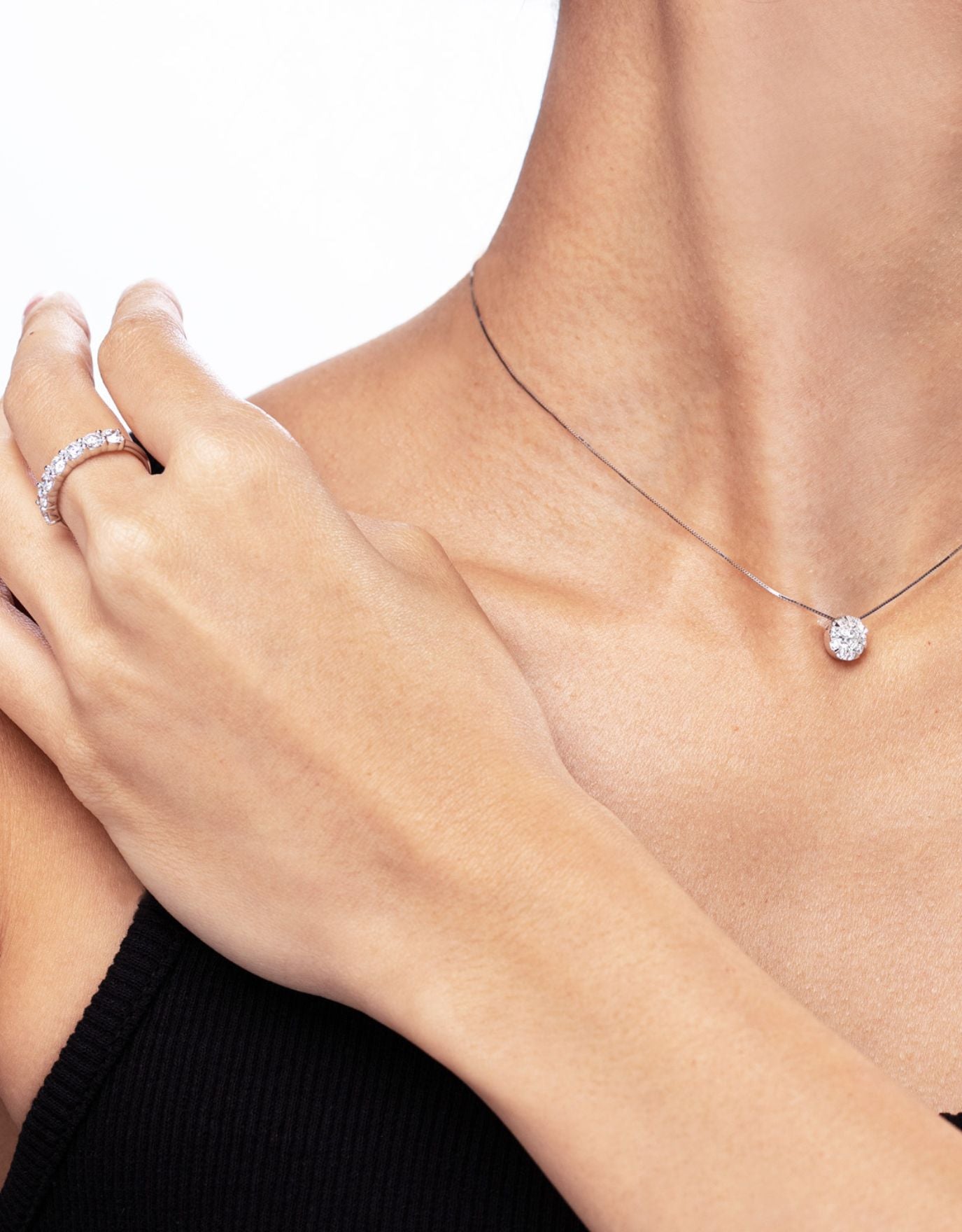 LVC Wedding Band designed with a row of glistening diamonds worn by a woman 