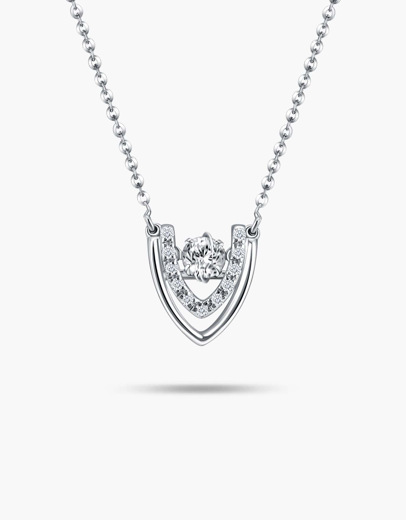 LVC necklace in white gold shaped into a 'v', topped with a center diamond stone