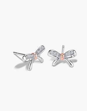 LVC diamond earrings with a bow design and diamonds in white gold and rose gold