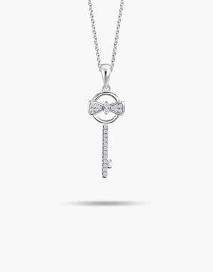 LVC necklace in white gold with key diamond pendant finished with a bow encrusted with diamonds