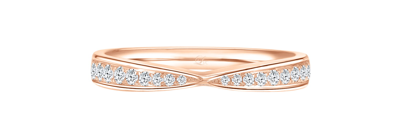 LVC wedding band in rose gold lined with two rows of round diamonds close up