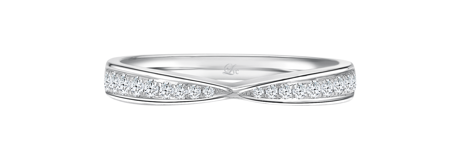 LVC wedding band lined with two rows of round diamonds close up