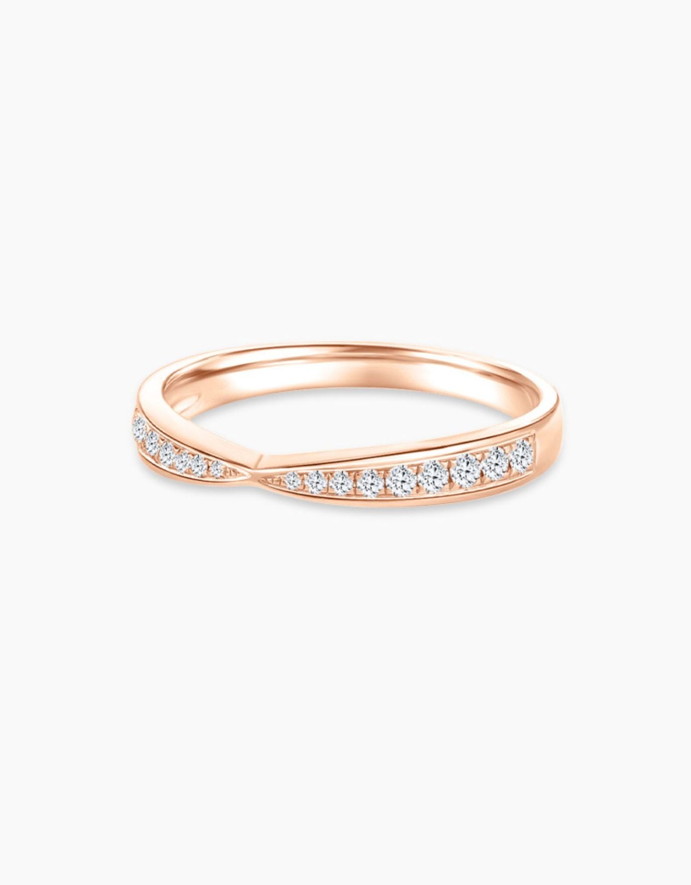 LVC wedding band in rose gold lined with two rows of round diamonds seen from different angle