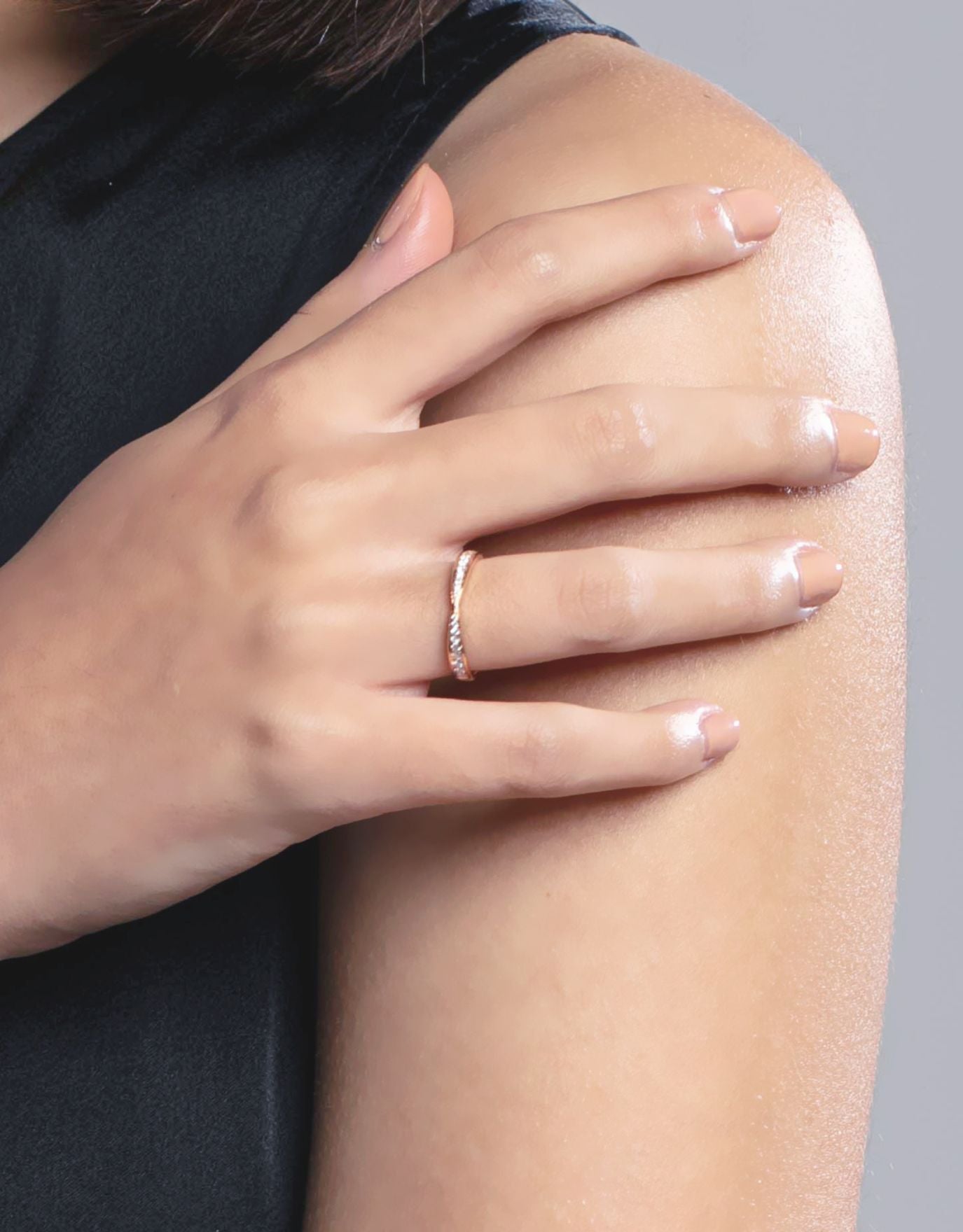 LVC wedding band lined with two rows of round diamonds worn on ring finger 