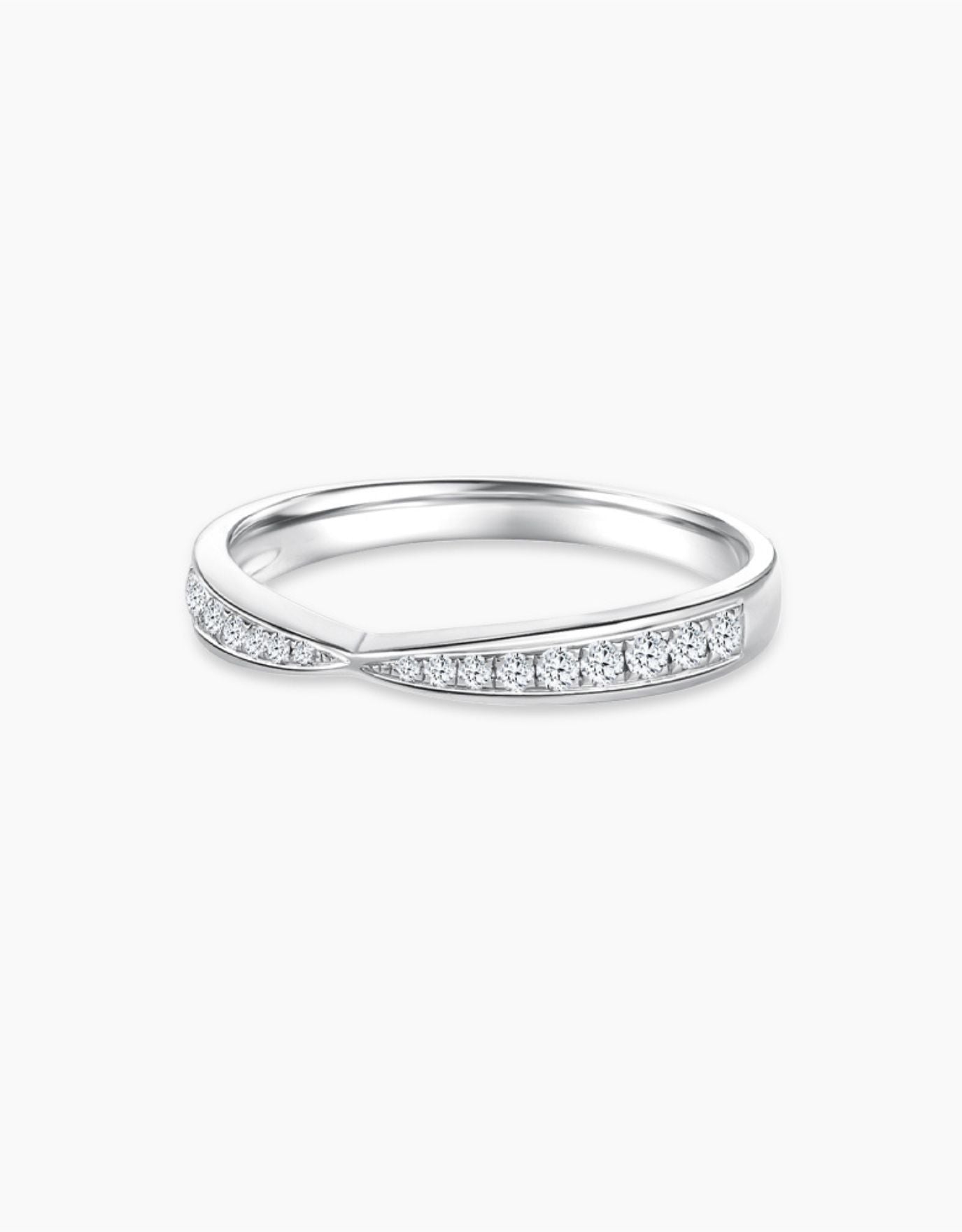 LVC wedding band lined with two rows of round diamonds seen from different angle