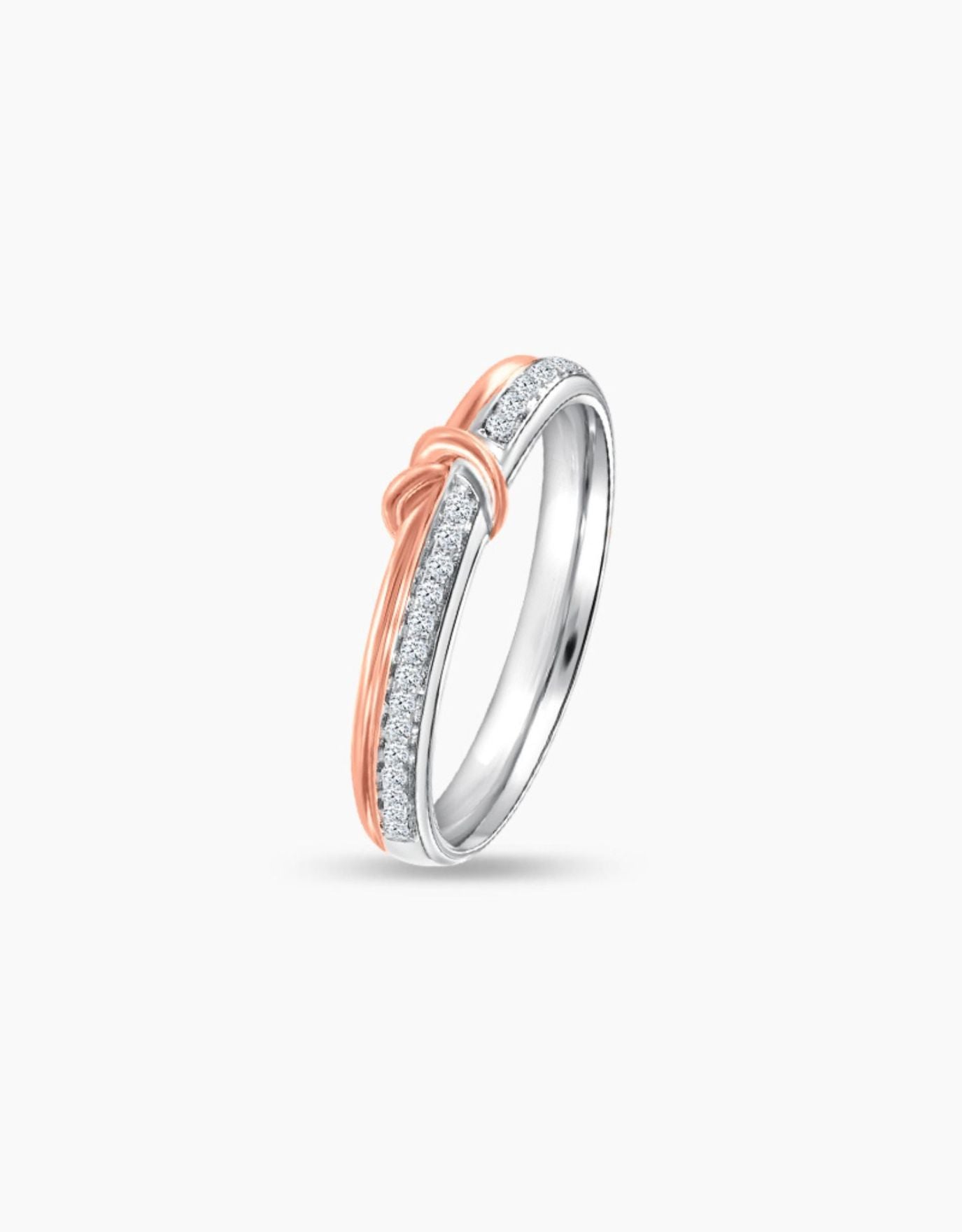 LVC wedding band in white and rose gold encrusted with a line of stunning diamonds seen from different angle