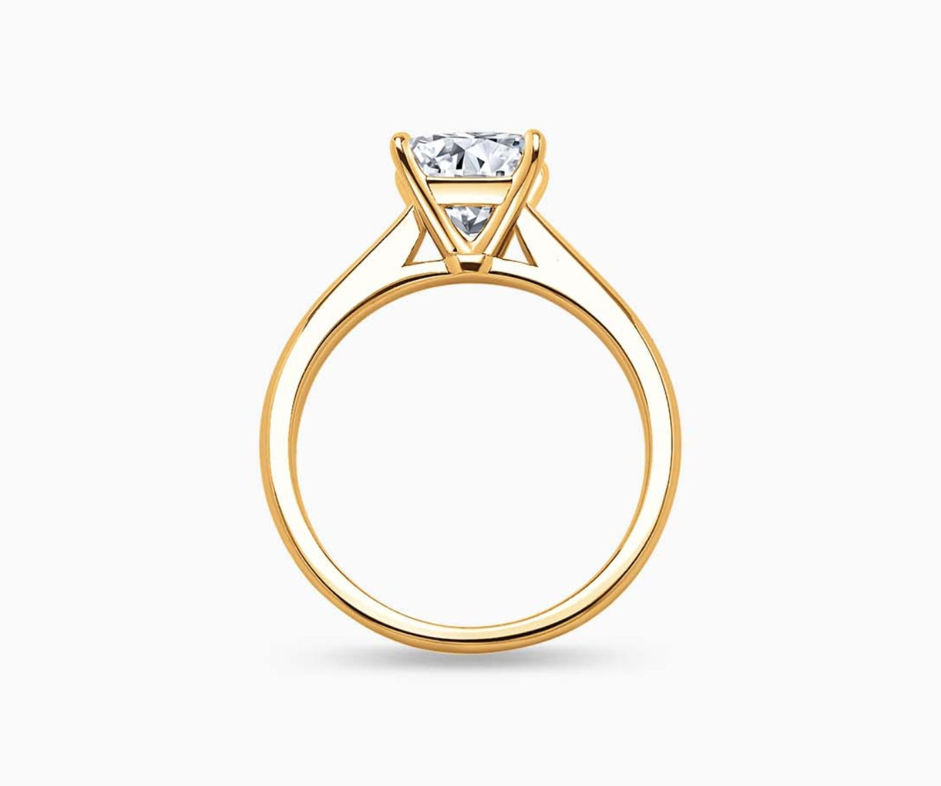 LVC solitaire ring with tapered plain band design which tapers inwards going from thick to thin with a diamond on the centre in yellow gold from other view