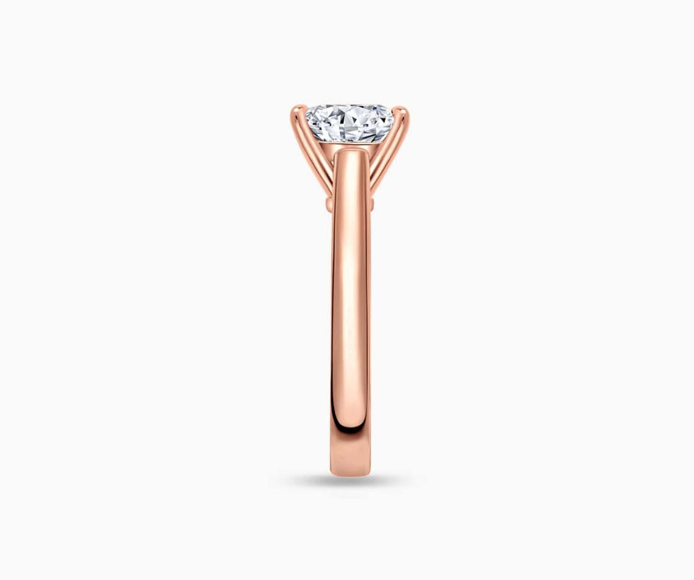 LVC solitaire ring with classic straight band style, made for your everyday sparkle in rose gold seen from side angle
