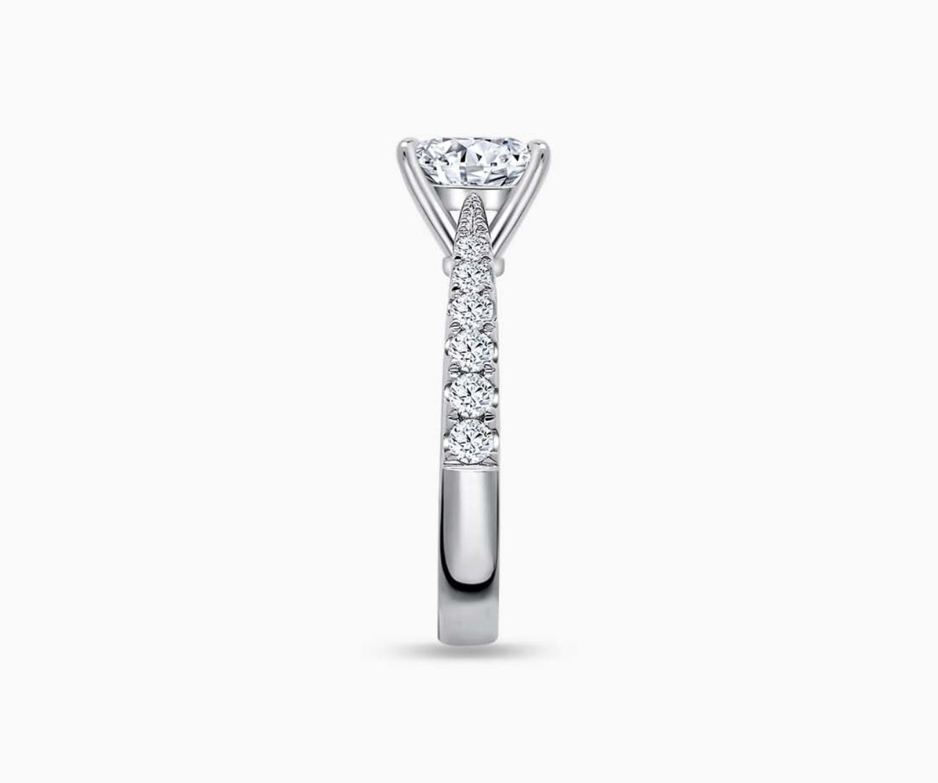 LVC solitaire ring tapered band lined with side diamonds, that narrows the width towards the mount, accentuates the beauty of the centre stone seen from side angle