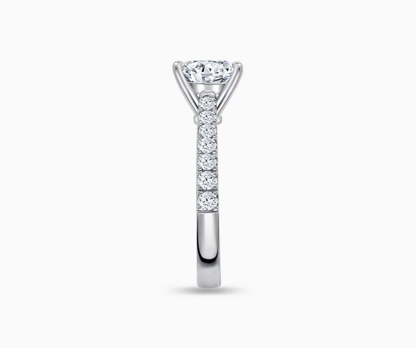 LVC solitaire ring with classic straight band lined with side diamonds for your everyday sparkle seen from side angle