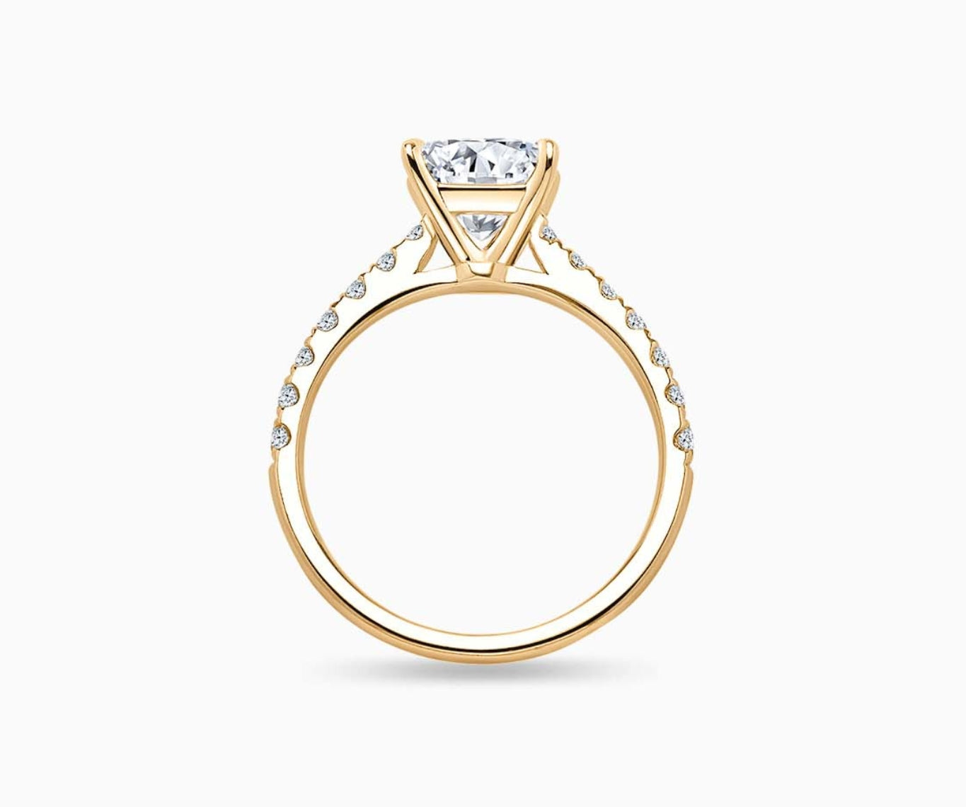 LVC solitaire ring with classic straight pave band lined with side diamonds and big diamond on the centre in yellow gold from different view