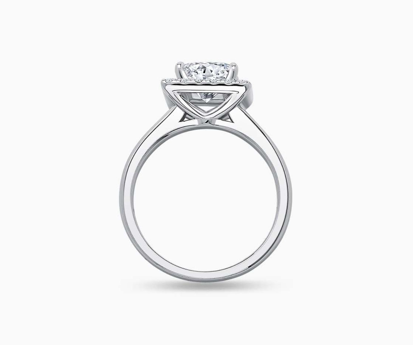 side view of Princess Cut Halo Diamond Engagement Ring with tapered plain band