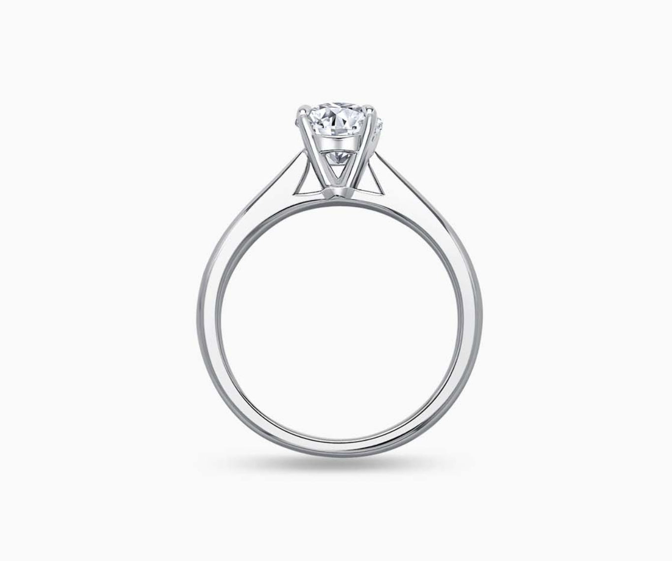 LVC solitaire ring with tapered plain band style that narrows the width towards the mount, accentuates the beauty of the centre stone seen from different angle